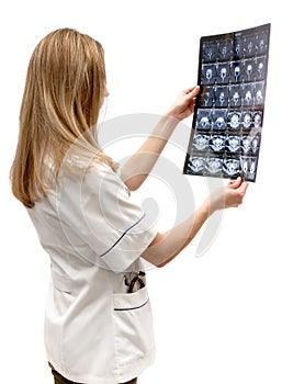 Medical examination. Doctor watching ct-scan photo