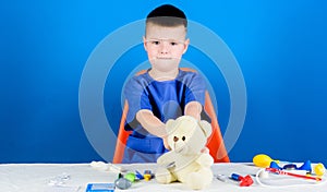 Medical examination. Medical procedures for teddy bear. Boy cute child future doctor career. Hospital worker. Health