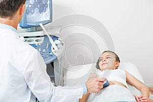 Medical examination of smiling little girl