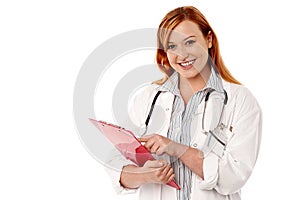 Medical expert holding clipboard