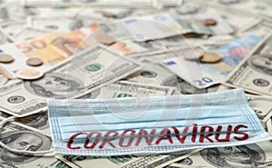 Medical face mask and money, world coronavirus epidemic and economic damages. Corona virus concept photo