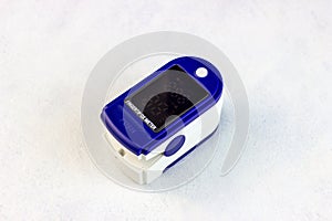 Medical fingertip pulse oximeter tool for oxygen saturation check during covid virus desease. SpO2 monitoring and heart rate