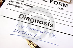 Medical form with diagnosis inflammatory arthritis. photo
