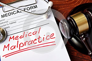 Medical form with words Medical Malpractice photo