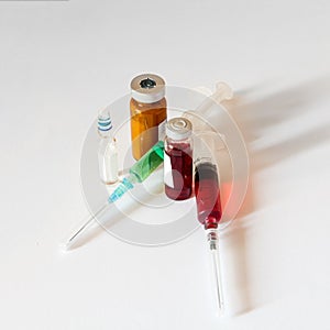 Medical glass bottle, ampoule, plastic medical syringe filled wi