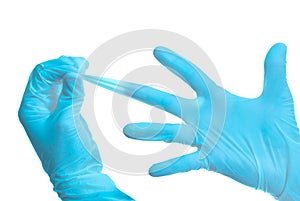 Hands with Blue Medical Gloves photo