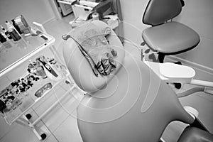 medical gloves hang on the back of the dental chair, medical office