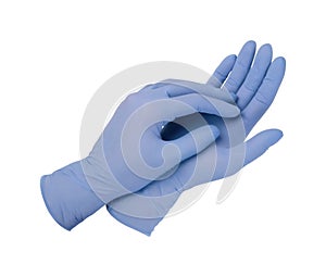 Medical gloves.Two blue surgical gloves isolated on white background with hands. Rubber glove manufacturing, human hand