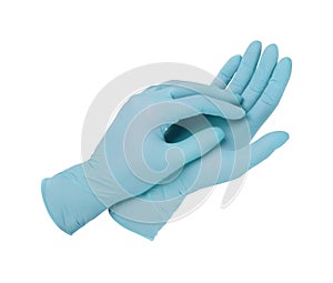 Medical gloves. Two blue surgical gloves isolated on white background with hands. Rubber glove manufacturing, human hand