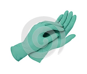 Medical gloves. Two green surgical gloves isolated on white background with hands. Rubber glove manufacturing, human