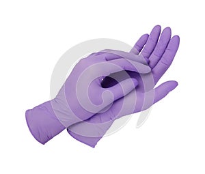 Medical gloves. Two purple surgical gloves isolated on white background with hands. Rubber glove manufacturing, human