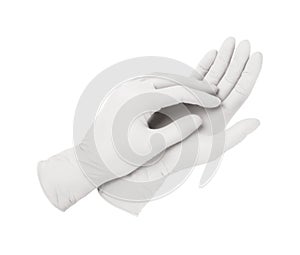 Medical gloves. Two white surgical gloves isolated on white background with hands. Rubber glove manufacturing, human