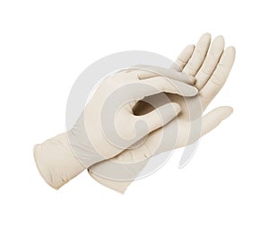 Medical gloves. Two white surgical gloves isolated on white background with hands. Rubber glove manufacturing, human