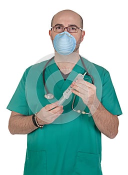 Medical green uniforms preparing a syringe