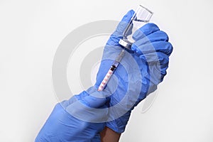 Medical hand gloves dispose medication drug needle syringe drug,concept flu shot vaccine vial dose hypodermic injection treatment