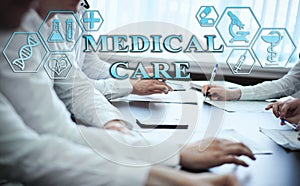 Medical healthcare concept - group of doctors in hospital with digital medical icons, graphic banner showing symbol of medicine,