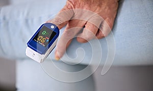 Medical, heart rate and woman with a pulse oximeter in a retirement home during consultation. Healthcare, treatment and