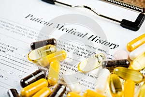 Medical history document with medicine