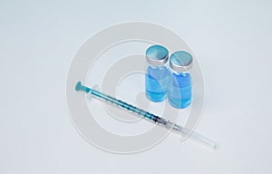 Medical injection. Coronavirus vaccine vials in a row.