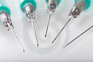 Medical injection needles on syrenges