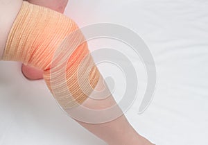 Medical kneecap for fixing the sore knee from arthritis and knee inflammation, for unloading the joint, close-up, copy space