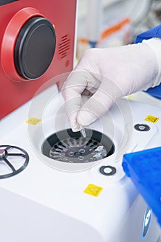 Medical lab scientists in labor using  PCR test equipment contain colorless Reaction vessel .