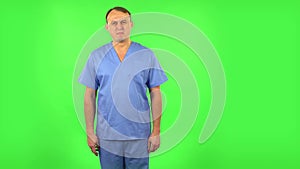 Medical man disappointedly says oh my good. Green screen