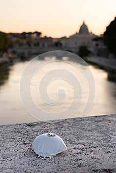 Medical mask on the background of the city