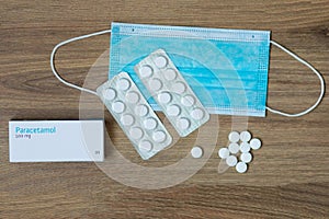 Medical masks color and paracetomol 500 mg for protection against flu and coronavirus.
