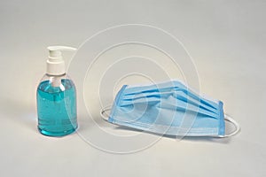 Medical masks and ethyl alcohol sanitizer are used for cleaner and protection against infection, Corona virus, Covid-19