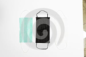 Medical multi-colored masks on isolated background. Surgical Ear-Loop Mask on White