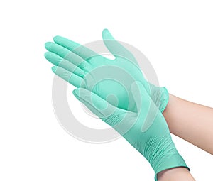 Medical nitrile gloves.Two green surgical gloves isolated on white background with hands. Rubber glove manufacturing, human hand