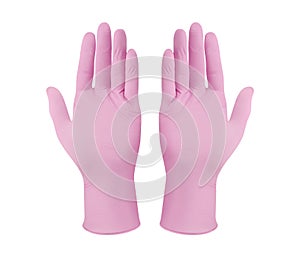 Medical nitrile gloves.Two pink surgical gloves isolated on white background with hands. Rubber glove manufacturing, human hand