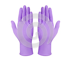 Medical nitrile gloves.Two violet surgical gloves isolated on white background with hands. Rubber glove manufacturing, human hand