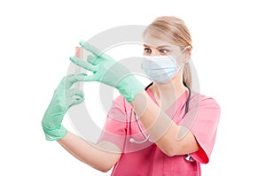 Medical nurse lady checking syringe with serum