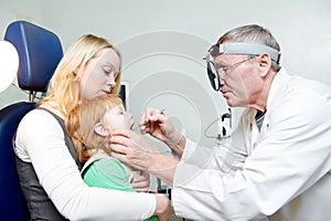 Medical otitus examination of child