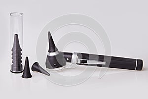 Medical otoscope used by ENT doctor for ear examination.