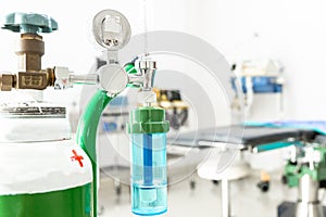 Medical oxygen flow meter shows low oxygen with patient bed in hospital, Equipment medical Oxygen tank and Cylinder for care a
