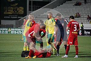 medical personnel FC Rubin assists injured player