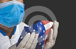 Medical personnel holding the American flag