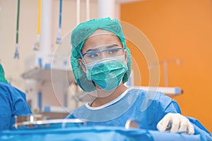 Medical physician doctor or Surgery team in operation room with lighting at hospital