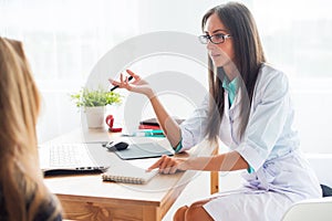 Medical physician doctor woman talking to patient