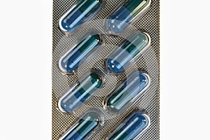 Medical pills. Blue tablet in transparet bister park