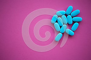 Medical pills for disease treatment.Blue vitamin pill