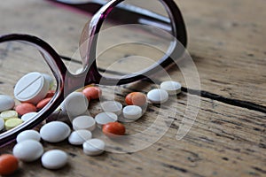 Medical pills and glasses photo