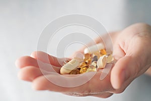 Medical pills in a hand. medical background with copy space.