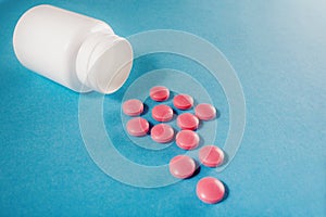 Medical pills round shape and bright bottle