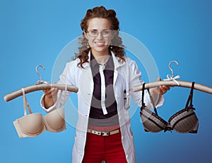 Medical practitioner woman showing comfortable bra and sexy bra