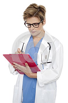 Medical practitioner writing prescription