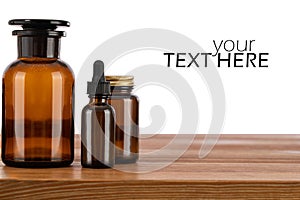 Medical products, bottles on wooden background. Copy-space
